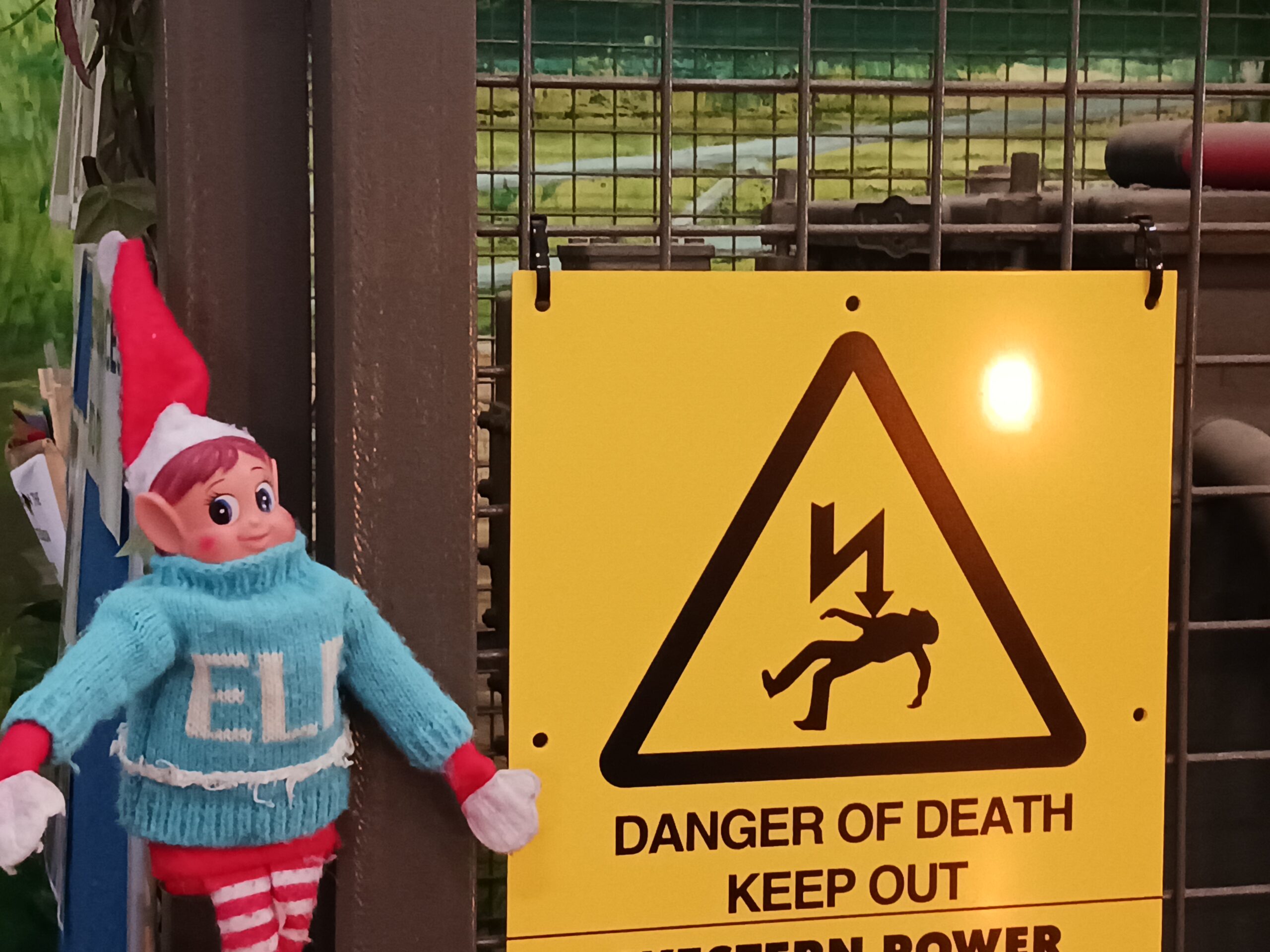 Safety Centre Christmas Elf and warning sign