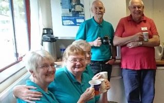 Volunteers drinking tea